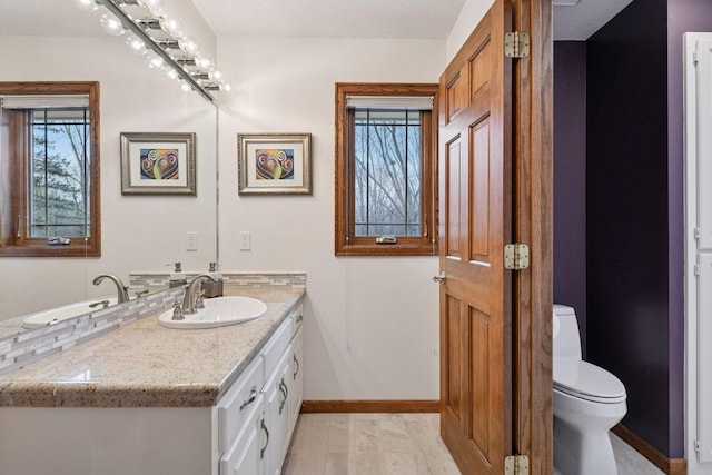 3600 Wedgewood Ln N, Plymouth, MN 55441 - bathroom with vanity and toilet
