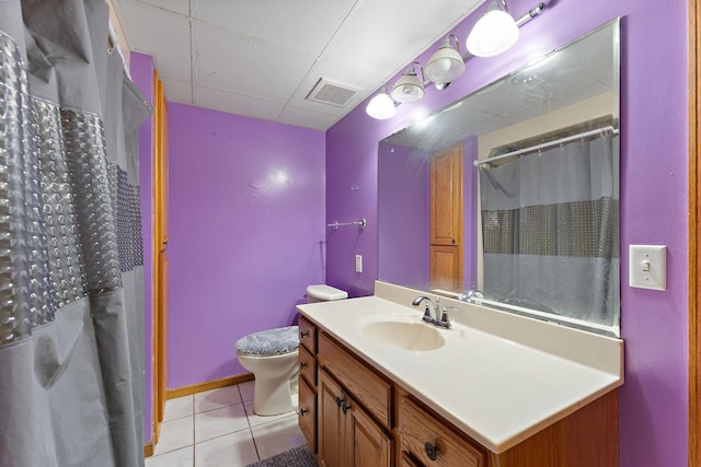 7609 James Ave N, Brooklyn Park, MN 55444 - full bathroom with tile patterned flooring, vanity, a paneled ceiling, and curtained shower