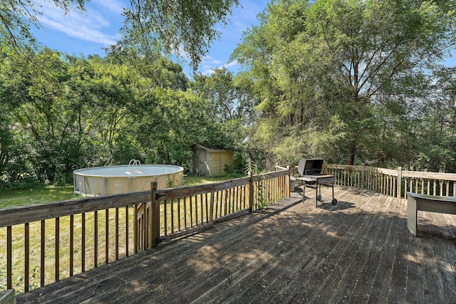 7609 James Ave N, Brooklyn Park, MN 55444 - wooden deck with a storage unit