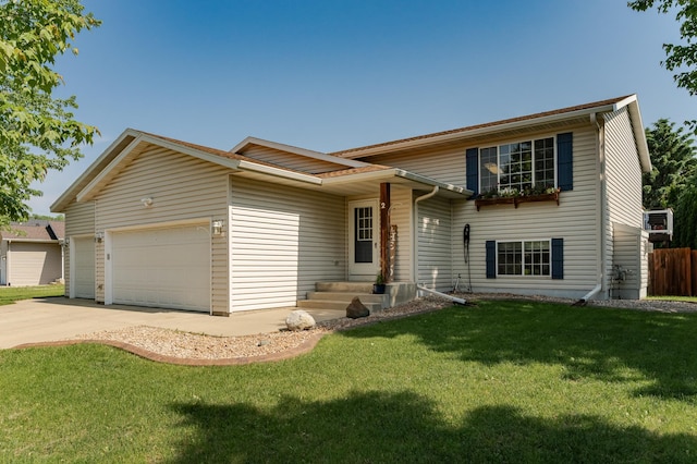 2 Lillie Ln SE, Pine Island, MN 55963 - tri-level home featuring a garage and concrete driveway