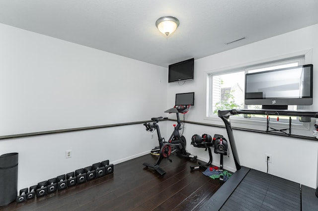 2 Lillie Ln SE, Pine Island, MN 55963 - exercise area with wood finished floors and baseboards