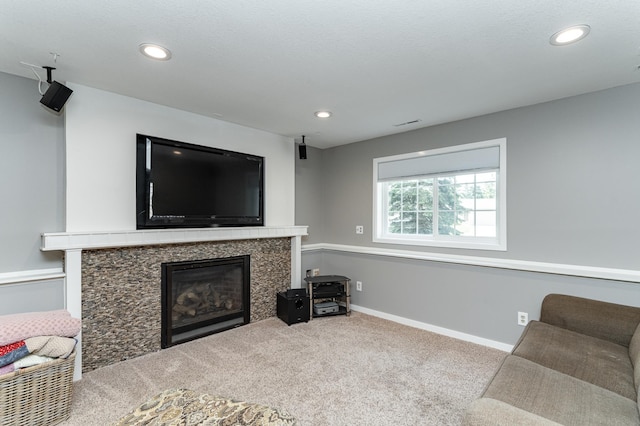 2 Lillie Ln SE, Pine Island, MN 55963 - living area featuring carpet floors, recessed lighting, and a tiled fireplace