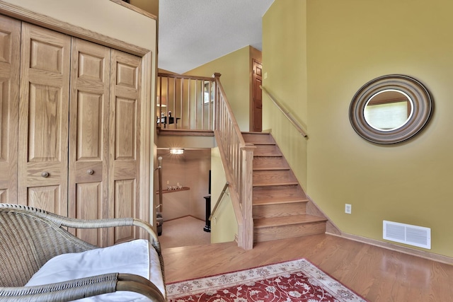 6 Pleasant View Ln, Circle Pines, MN 55014 - stairs with wood finished floors and baseboards