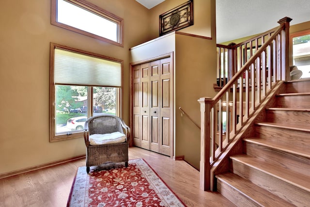 6 Pleasant View Ln, Circle Pines, MN 55014 - entrance foyer featuring light wood-style flooring and stairway