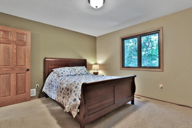 6 Pleasant View Ln, Circle Pines, MN 55014 - carpeted bedroom featuring a textured ceiling and baseboards