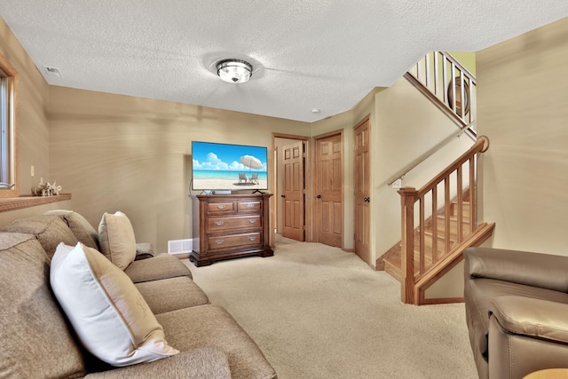6 Pleasant View Ln, Circle Pines, MN 55014 - living area featuring a textured ceiling, stairs, and carpet flooring