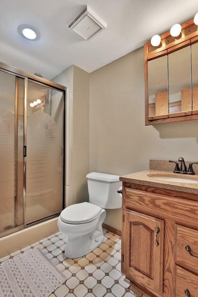 6 Pleasant View Ln, Circle Pines, MN 55014 - bathroom featuring vanity, a stall shower, and tile patterned floors