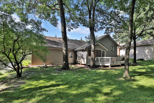 6 Pleasant View Ln, Circle Pines, MN 55014 - rear view of house featuring a wooden deck and a lawn