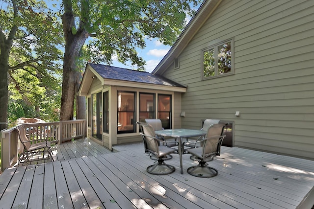 6 Pleasant View Ln, Circle Pines, MN 55014 - wooden terrace with outdoor dining area and a sunroom