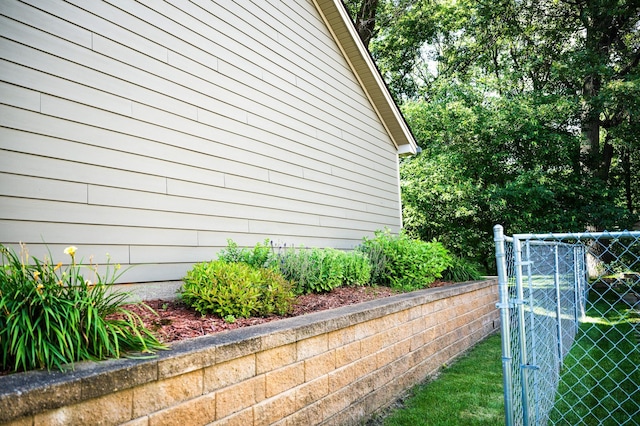 6 Pleasant View Ln, Circle Pines, MN 55014 - view of side of home featuring a gate