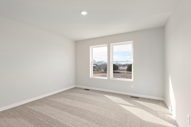 39730 Fallbrook Ave, North Branch, MN 55056 - carpeted empty room featuring baseboards and recessed lighting