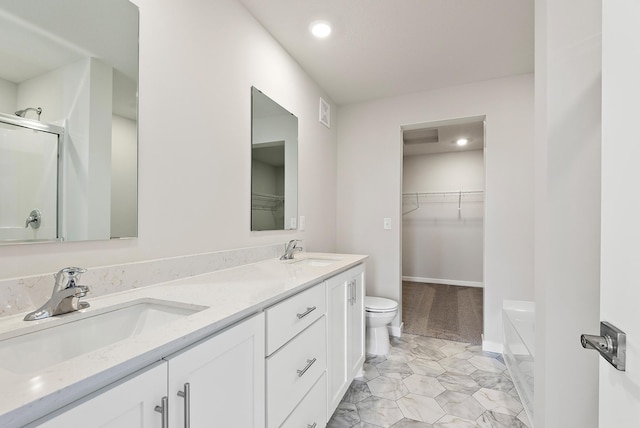 39730 Fallbrook Ave, North Branch, MN 55056 - bathroom with double vanity, a spacious closet, a shower with door, recessed lighting, and a bath