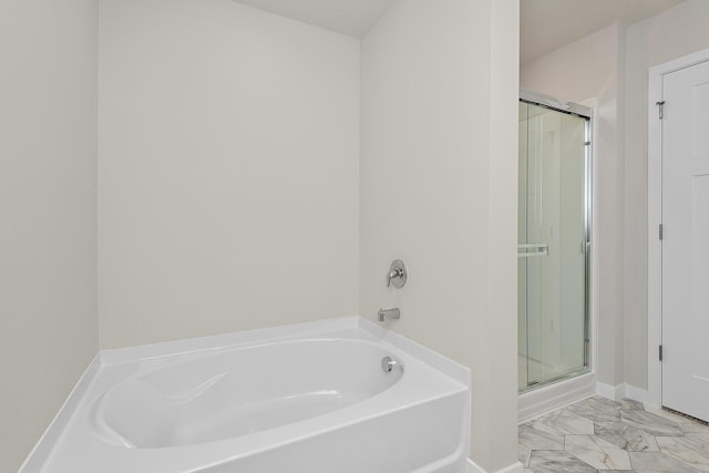 39730 Fallbrook Ave, North Branch, MN 55056 - bathroom featuring a garden tub, a stall shower, and marble look tile flooring