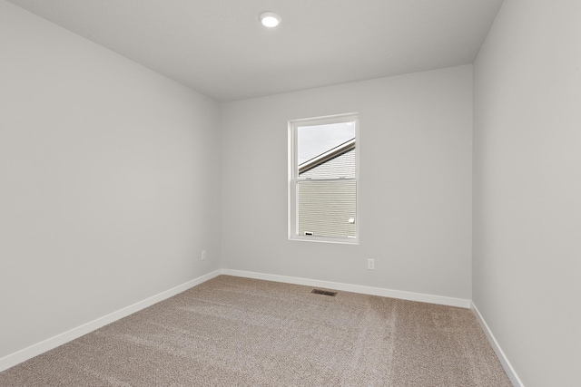 39730 Fallbrook Ave, North Branch, MN 55056 - carpeted empty room with baseboards and recessed lighting