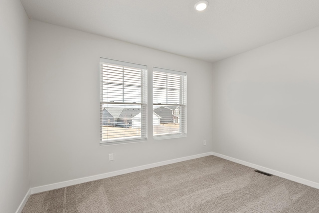 39730 Fallbrook Ave, North Branch, MN 55056 - carpeted spare room featuring baseboards and recessed lighting