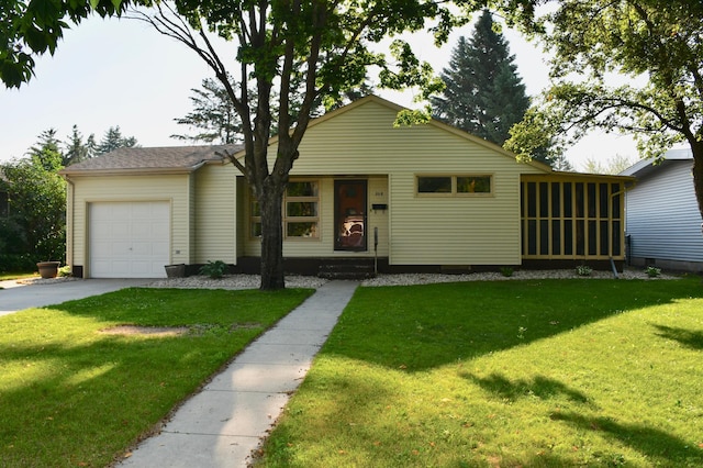 308 Maple Ave S, Thief River Falls, MN 56701 - ranch-style home featuring an attached garage, a front lawn, and driveway