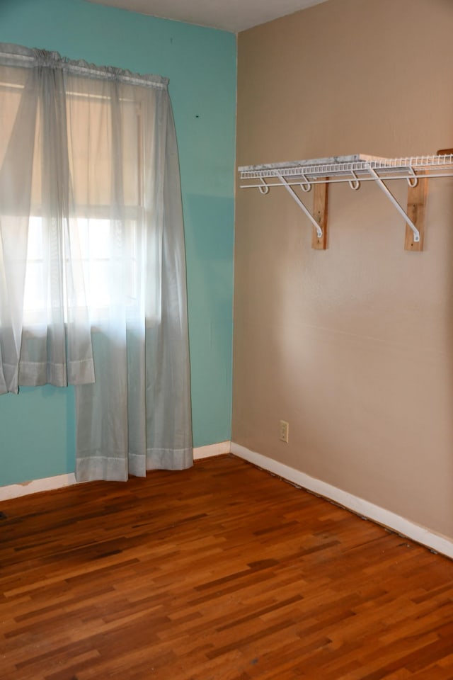 308 Maple Ave S, Thief River Falls, MN 56701 - spacious closet with wood finished floors