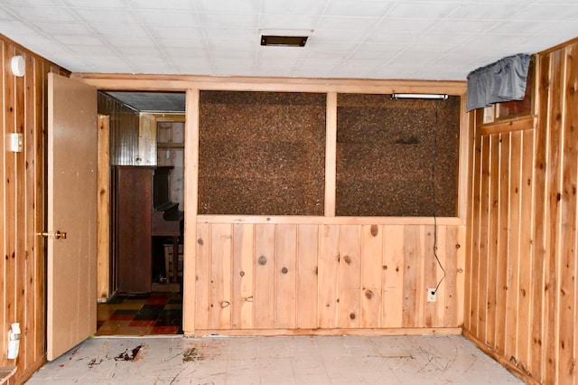 308 Maple Ave S, Thief River Falls, MN 56701 - unfurnished room with wooden walls
