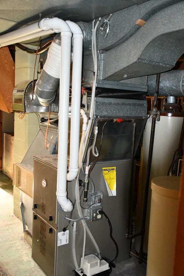 308 Maple Ave S, Thief River Falls, MN 56701 - utility room featuring water heater