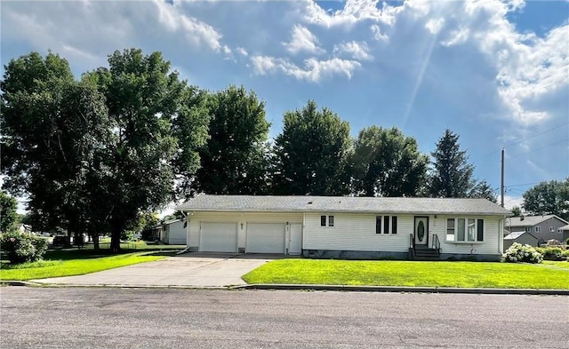 690 10th St, Granite Falls, MN 56241 - ranch-style home featuring an attached garage, driveway, a front lawn, and entry steps