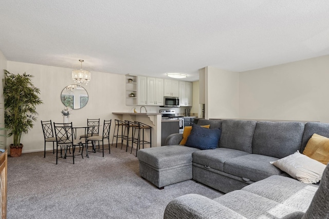 13525 Zenith Ln, Eden Prairie, MN 55346 - carpeted living area with a chandelier and a textured ceiling
