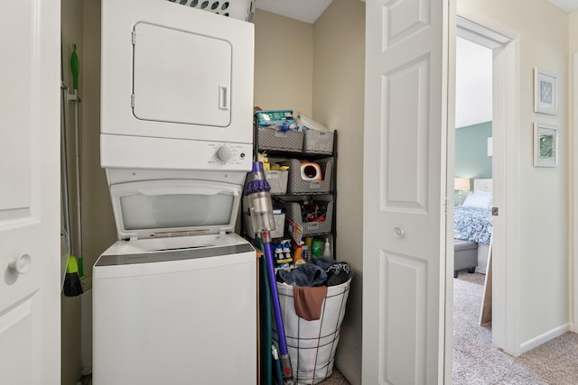 13525 Zenith Ln, Eden Prairie, MN 55346 - laundry area with estacked washer and dryer and carpet floors