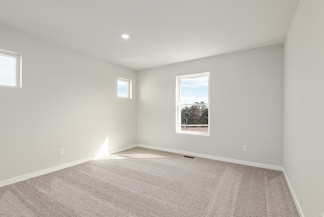 39729 Fallbrook Ave, North Branch, MN 55056 - spare room featuring carpet flooring and recessed lighting