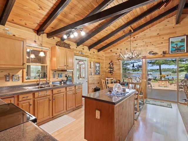 26803 Pelican Beach Rd, Merrifield, MN 56465 - kitchen featuring wooden ceiling, light wood-style flooring, wooden walls, a chandelier, and a center island