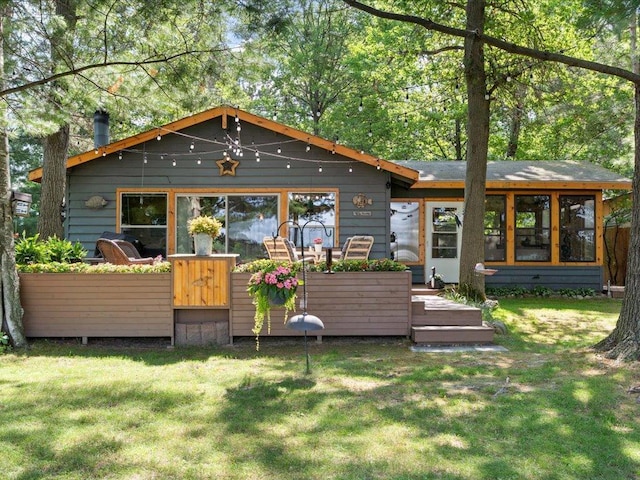 26803 Pelican Beach Rd, Merrifield, MN 56465 - rear view of house with a yard and a chimney