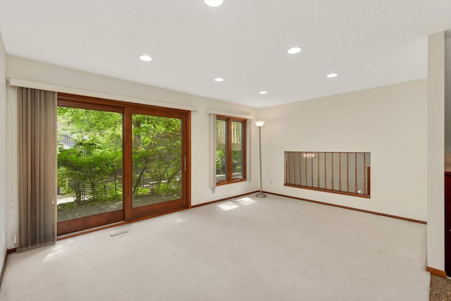8040 Lea Rd, Bloomington, MN 55438 - unfurnished room with carpet floors and recessed lighting