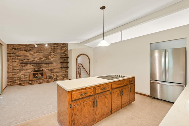 8040 Lea Rd, Bloomington, MN 55438 - kitchen featuring freestanding refrigerator, track lighting, black electric cooktop, light countertops, and light tile patterned floors