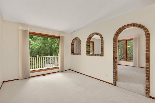 8040 Lea Rd, Bloomington, MN 55438 - carpeted empty room featuring baseboards