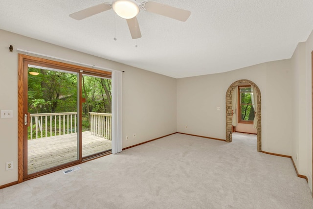 8040 Lea Rd, Bloomington, MN 55438 - empty room with carpet floors, a textured ceiling, and ceiling fan