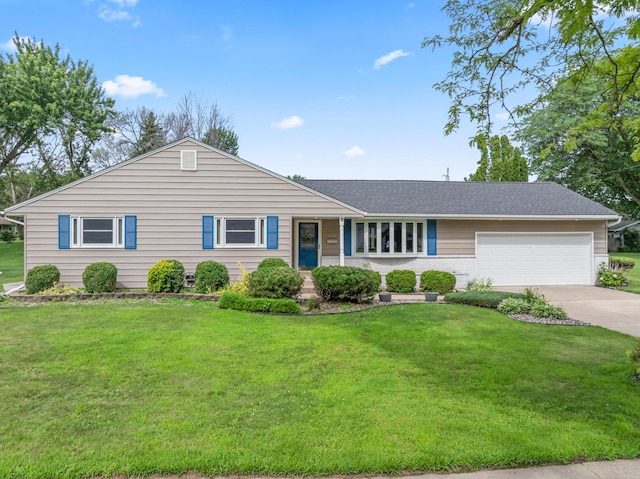 2100 10th St SW, Austin, MN 55912 - single story home featuring an attached garage, concrete driveway, a front yard, and a shingled roof