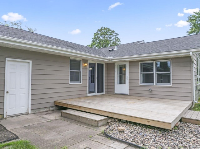 2100 10th St SW, Austin, MN 55912 - wooden terrace featuring a patio area