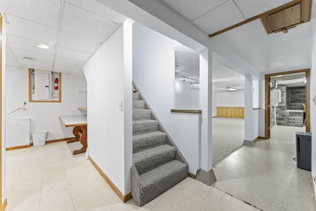 2100 10th St SW, Austin, MN 55912 - stairs featuring a drop ceiling and electric panel