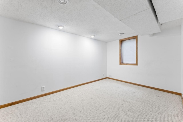 2100 10th St SW, Austin, MN 55912 - finished below grade area with carpet floors and baseboards