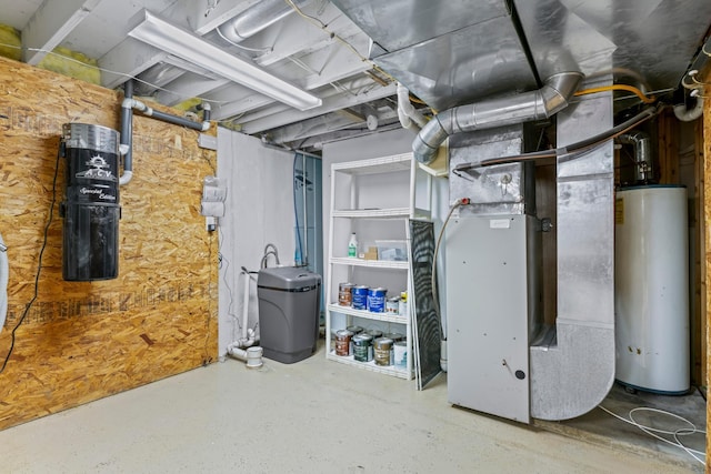 2100 10th St SW, Austin, MN 55912 - unfinished basement with water heater, a water softener system, and heating unit
