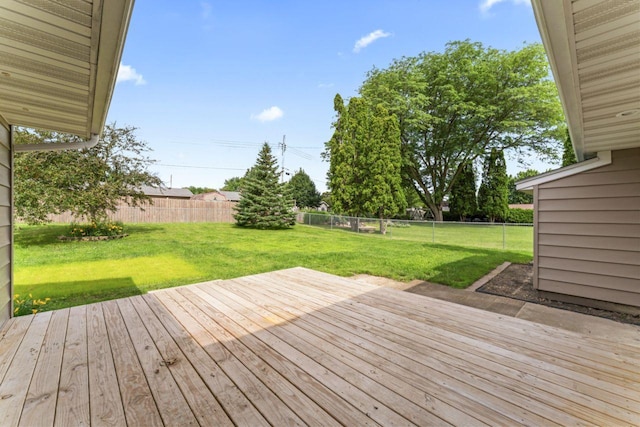 2100 10th St SW, Austin, MN 55912 - wooden deck featuring a fenced backyard