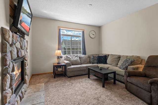 7735 Lachman Ave NE, Otsego, MN 55301 - living area featuring light carpet, a stone fireplace, and a textured ceiling