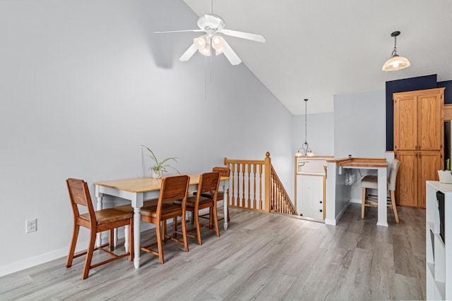 940 14th Ln SE, Cambridge, MN 55008 - dining space featuring light wood-style flooring, ceiling fan, and lofted ceiling
