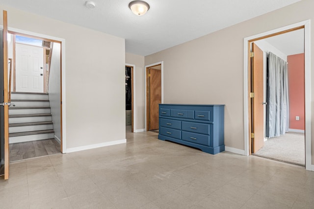 940 14th Ln SE, Cambridge, MN 55008 - unfurnished bedroom with baseboards