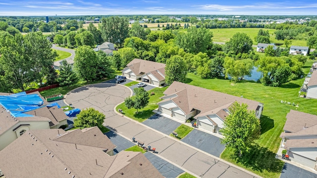 940 14th Ln SE, Cambridge, MN 55008 - aerial view of residential area featuring a tree filled landscape