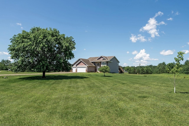 30354 118th St, Baldwin Twp, MN 55371 - view of front facade with an attached garage and a front yard