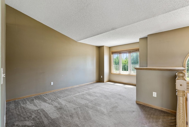 30354 118th St, Baldwin Twp, MN 55371 - carpeted spare room featuring a textured ceiling and baseboards