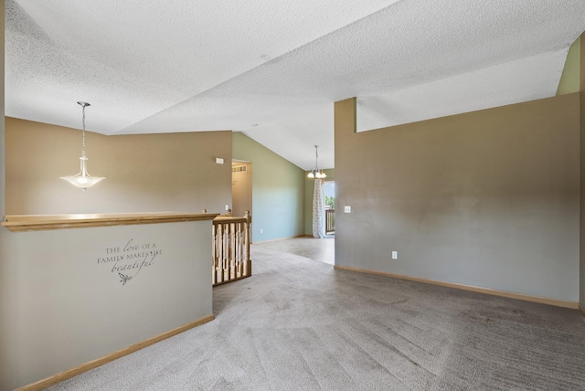 30354 118th St, Baldwin Twp, MN 55371 - carpeted spare room featuring lofted ceiling and baseboards