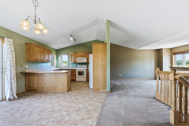 30354 118th St, Baldwin Twp, MN 55371 - kitchen featuring white appliances, vaulted ceiling, open floor plan, a chandelier, and light countertops