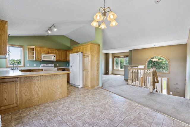 30354 118th St, Baldwin Twp, MN 55371 - kitchen with white appliances, a chandelier, lofted ceiling, light countertops, and hanging light fixtures
