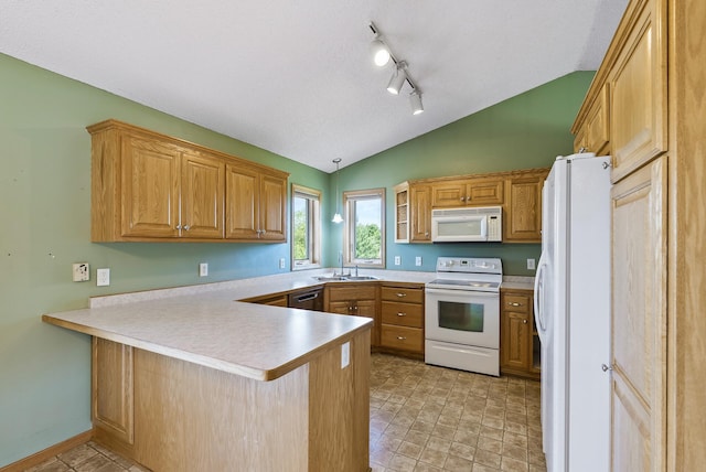 30354 118th St, Baldwin Twp, MN 55371 - kitchen with white appliances, lofted ceiling, a peninsula, and light countertops