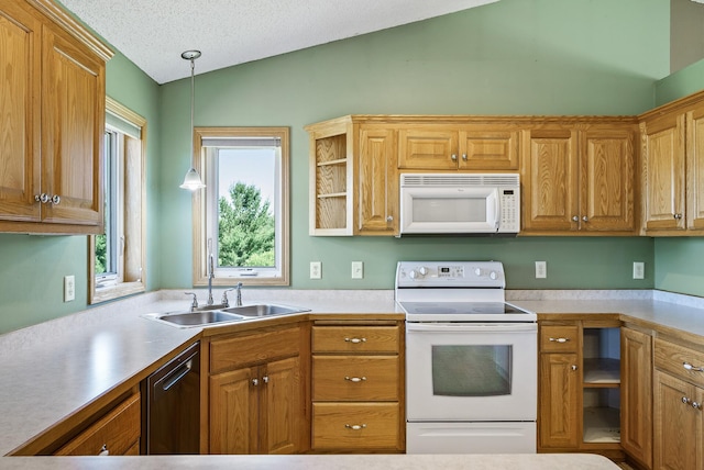 30354 118th St, Baldwin Twp, MN 55371 - kitchen with white appliances, vaulted ceiling, light countertops, hanging light fixtures, and brown cabinetry